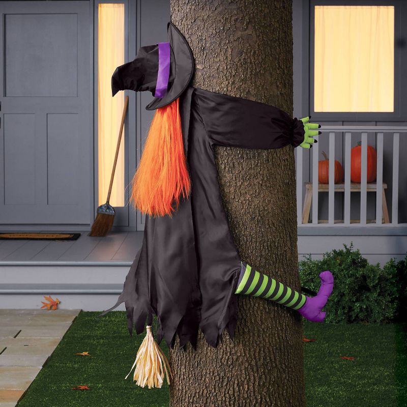 slide 2 of 3, Crashing Witch Halloween Decorative Prop - Hyde & EEK! Boutique™: Indoor/Outdoor Eerie Scene Setter, 1 ct