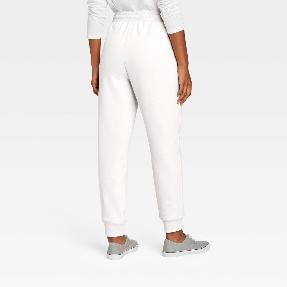 slide 2 of 3, Women's High-Rise Ankle Jogger Pants - A New Day Cream XS, 1 ct