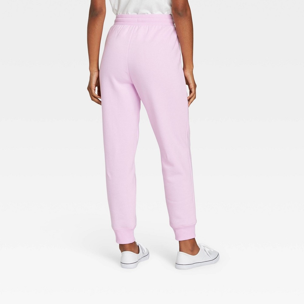 slide 2 of 3, Women's High-Rise Ankle Jogger Pants - A New Day Light Pink XS, 1 ct