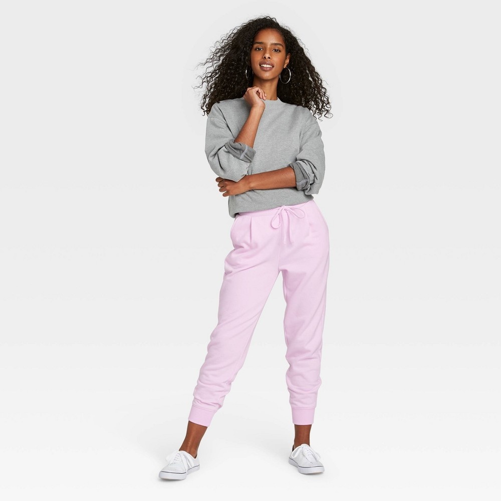 slide 3 of 3, Women's High-Rise Ankle Jogger Pants - A New Day Light Pink L, 1 ct