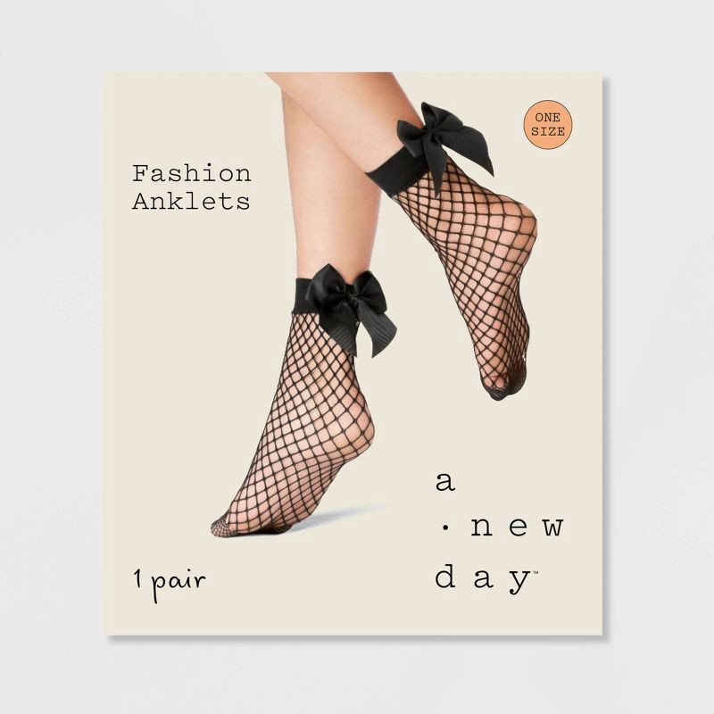 slide 2 of 2, Women's Fishnet Anklet with Bow - A New Day™ Black 4-10: Sheer Knit Socks, Smooth Toe Seams, 1 ct