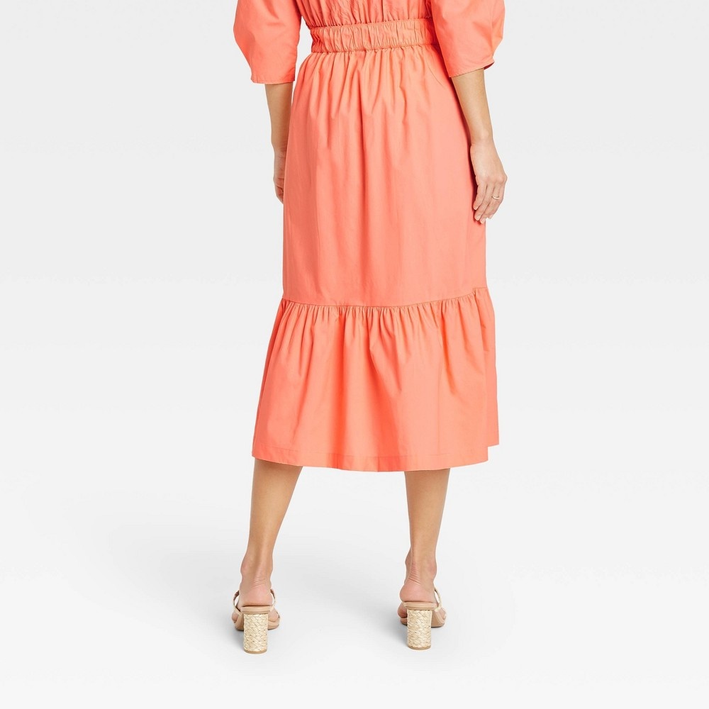 slide 2 of 3, Women's Tiered A-line Midi Skirt - A New Day Coral S, 1 ct