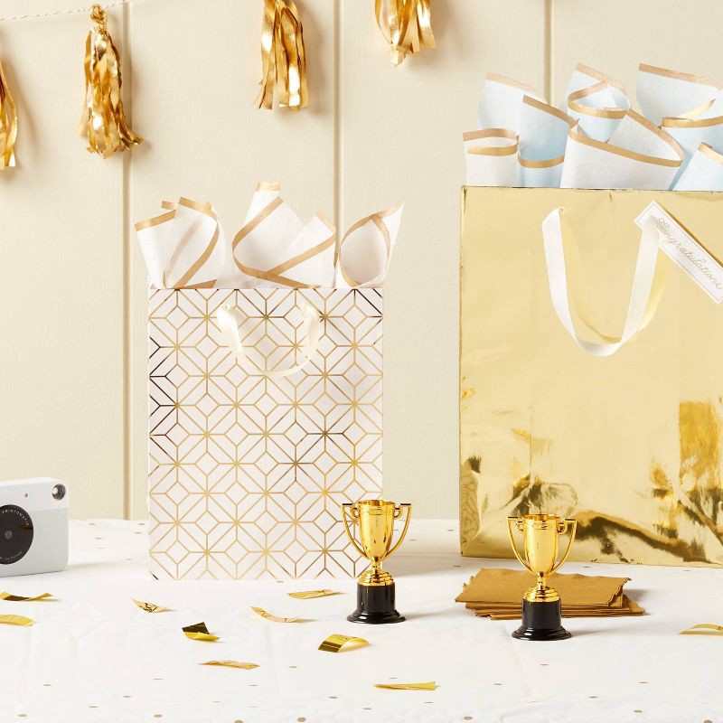 slide 2 of 3, 12ct Mini Trophy Party Favors Gold/Black - Spritz™: Inexpensive School Spirit Birthday Decor for Kids, 12 ct