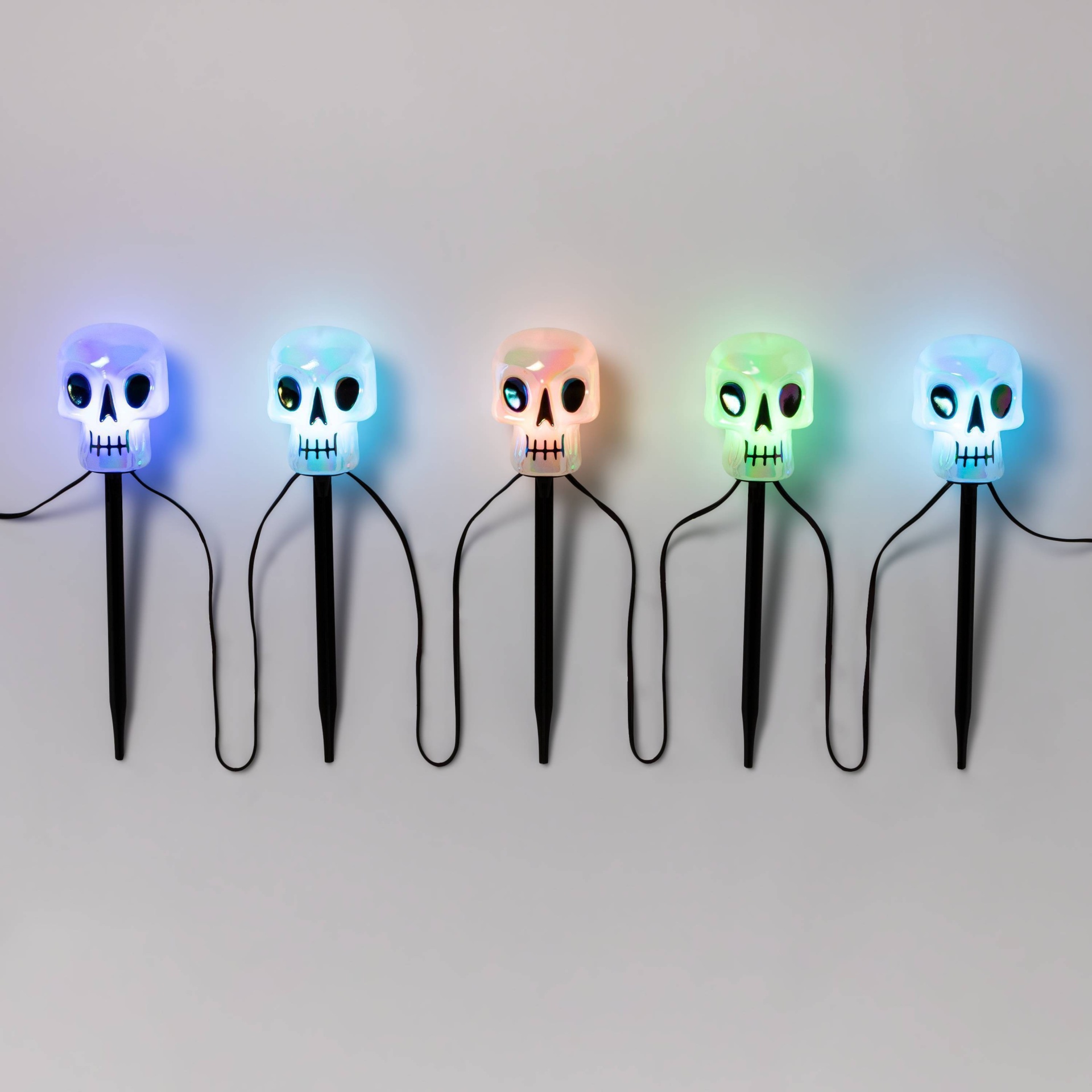 slide 1 of 3, LED Color Changing Iridescent Skull Halloween Novelty Path Lights - Hyde & EEK! Boutique, 5 ct