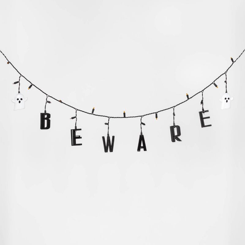 slide 1 of 3, 25ct LED "Beware" Halloween String Lights Orange/Purple/White - Hyde & EEK! Boutique™, 25 ct