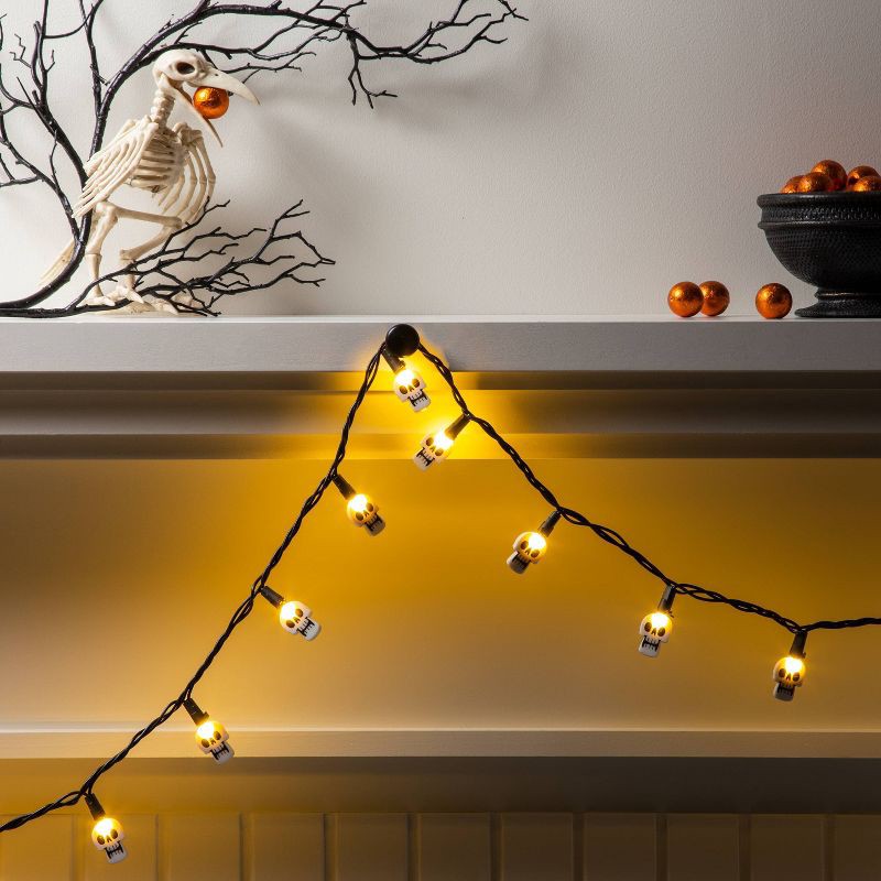 slide 3 of 4, 20ct LED Skull Halloween String Lights - Hyde & EEK! Boutique™, 20 ct