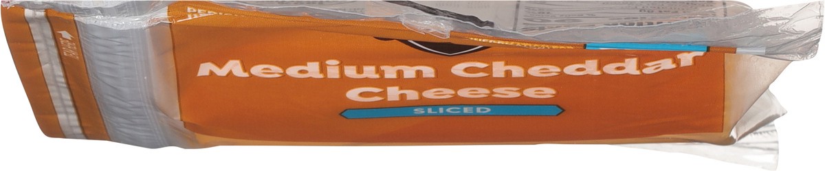slide 6 of 14, First Street Medium Cheddar Sliced, 8 oz