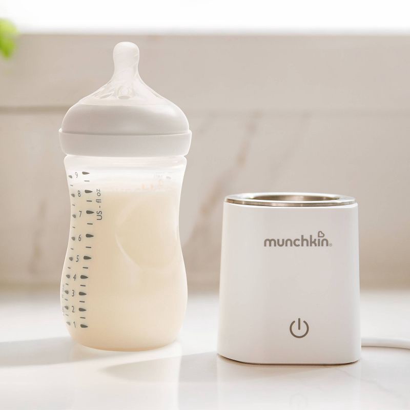 slide 2 of 4, New Munchkin 98° Digital Bottle Warmer – Perfect Temperature, Every Time, 1 ct