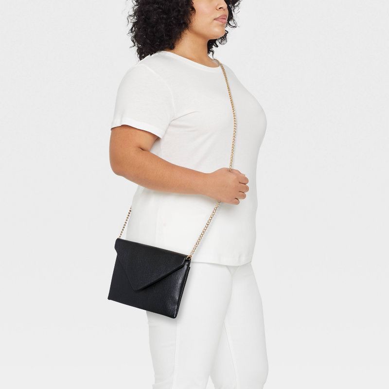 slide 2 of 6, Envelope Clutch - A New Day™ Black, 1 ct