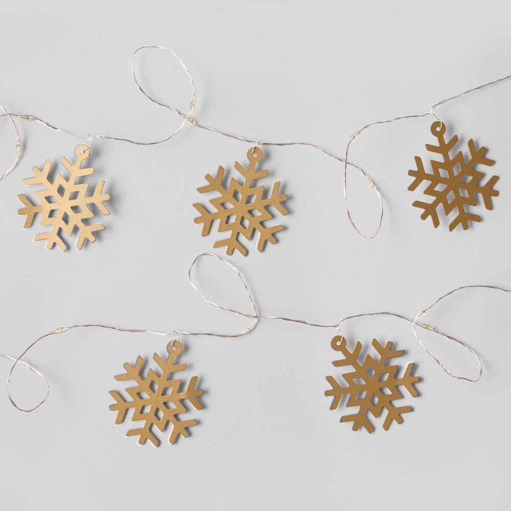 slide 2 of 4, Gold Snowflake Dew Drop Battery Operated LED Christmas String Lights with Timer Warm White with Silver Wire - Wondershop, 30 ct