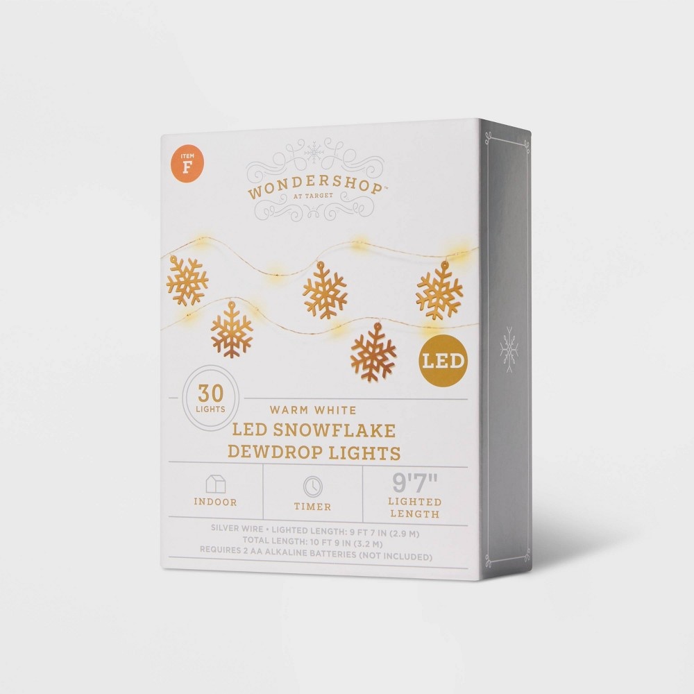 slide 3 of 4, Gold Snowflake Dew Drop Battery Operated LED Christmas String Lights with Timer Warm White with Silver Wire - Wondershop, 30 ct