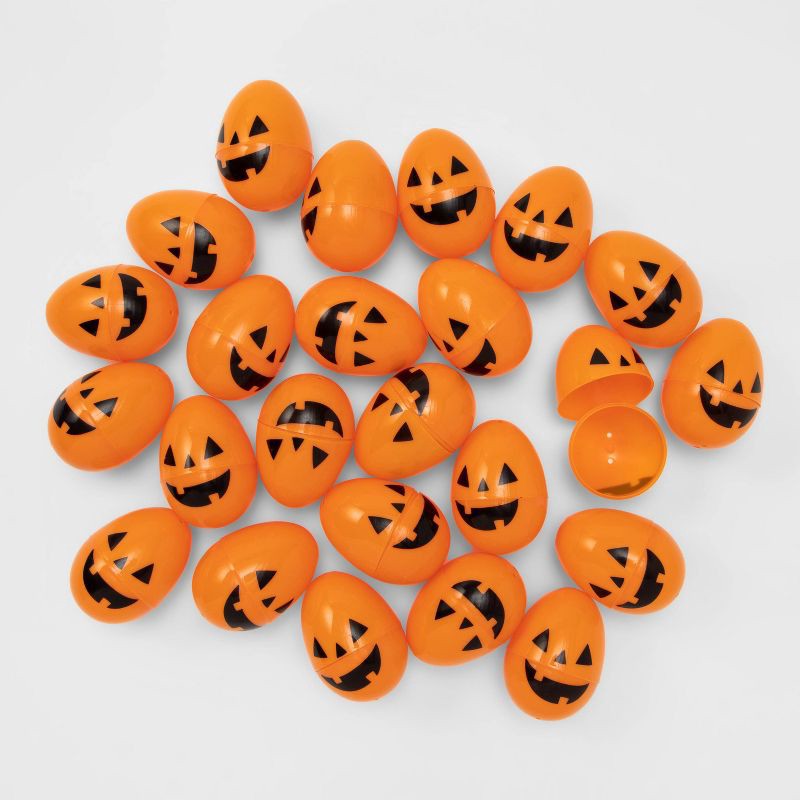 slide 1 of 3, 24ct Orange Fillable Eggs for Halloween Egg Hunt - Hyde and EEK! Boutique™: Indoor Party Decor, 2.33" Height, 24 ct