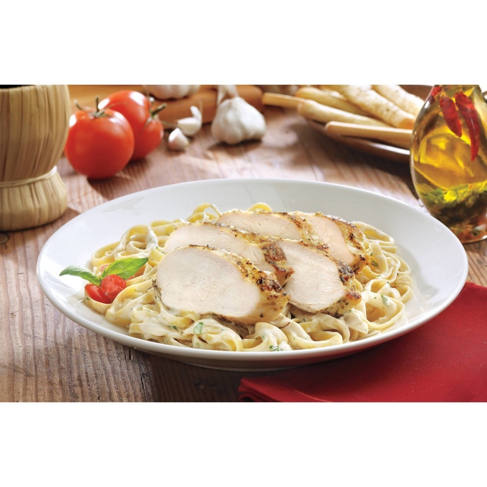 slide 3 of 4, Tyson Oven Ready Family Size Roasted Garlic Alfredo Fettucini Pasta & Chicken, 38 oz