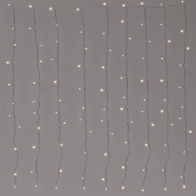 slide 1 of 5, 100ltr LED Plug-in Curtain String Lights with Clips - Room Essentials™: UL Listed, Indoor/Outdoor, 8 Settings, 1 ct