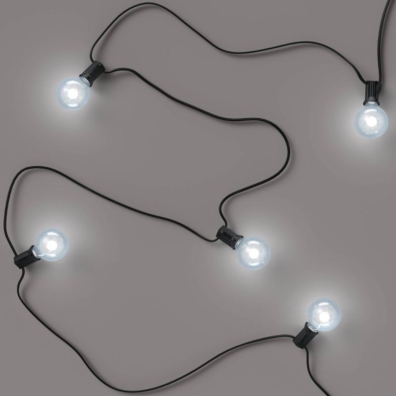 slide 1 of 4, LED Globe String Lights Black - Room Essentials™: Indoor/Outdoor, Connects End to End, UL Listed, 1 ct