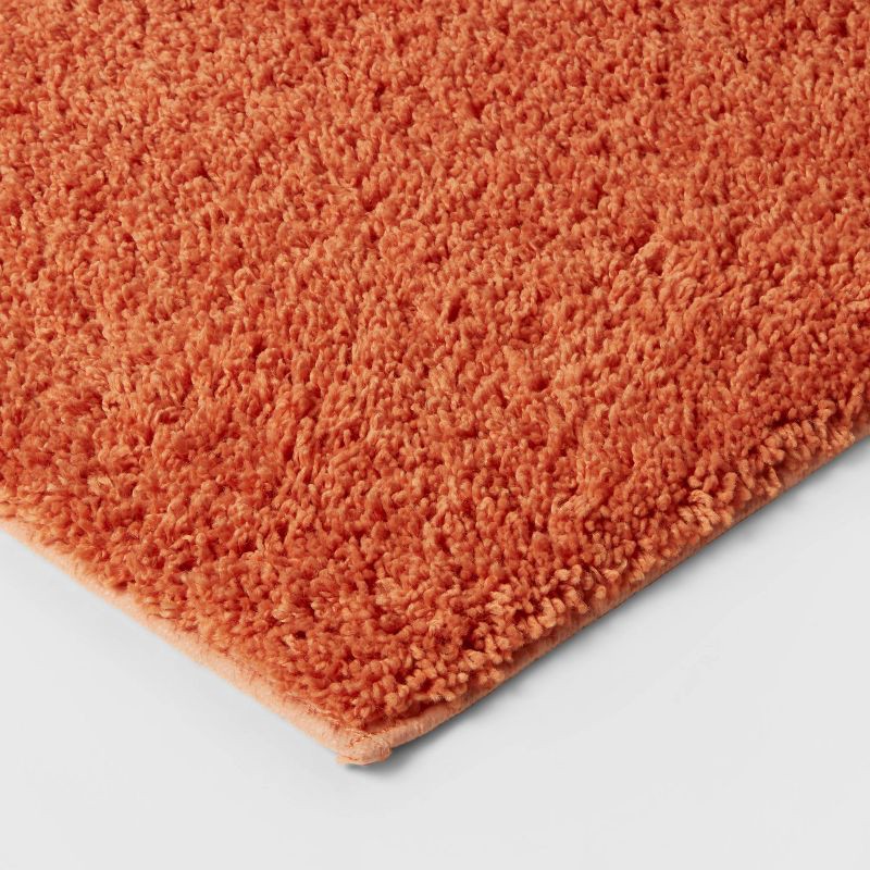 slide 3 of 4, 20"x34" Antimicrobial Bath Rug Orange - Threshold™: Machine Washable, Latex Backed, Tufted Polyester, 1 ct