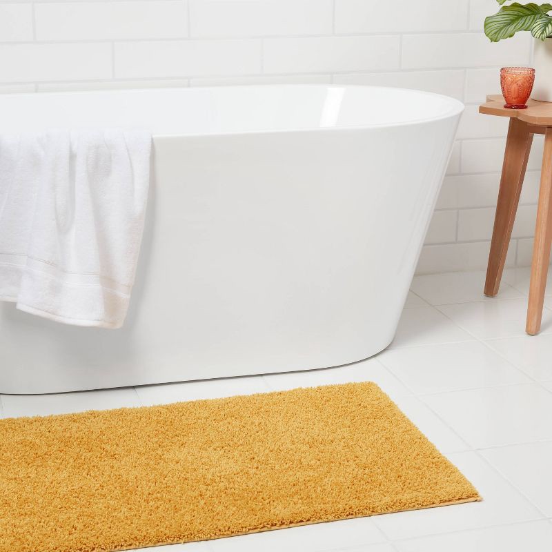 slide 2 of 4, 23"x37" Antimicrobial Bath Rug Gold - Threshold™: Machine Washable, Latex Backed, Tufted Polyester, 1 ct