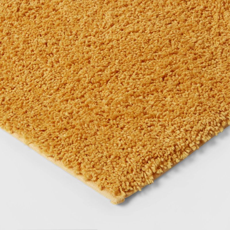 slide 3 of 4, 23"x37" Antimicrobial Bath Rug Gold - Threshold™: Machine Washable, Latex Backed, Tufted Polyester, 1 ct