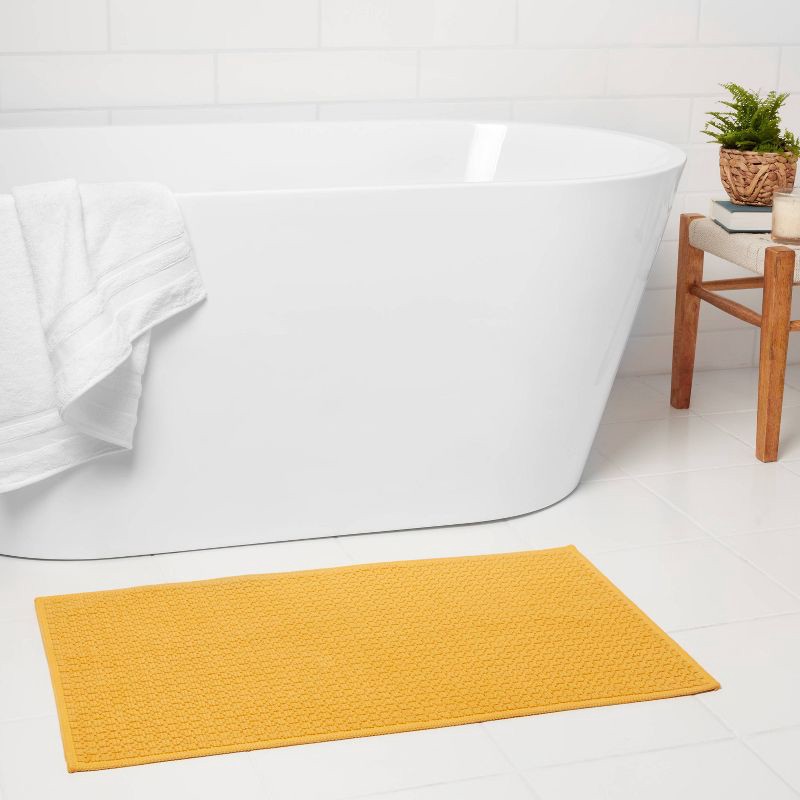 slide 2 of 3, 20"x34" Antimicrobial Bath Rug Gold - Threshold™, 1 ct