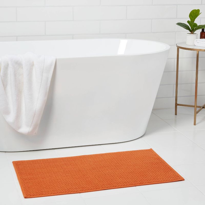 slide 2 of 3, 20"x34" Antimicrobial Bath Rug Orange - Threshold™, 1 ct