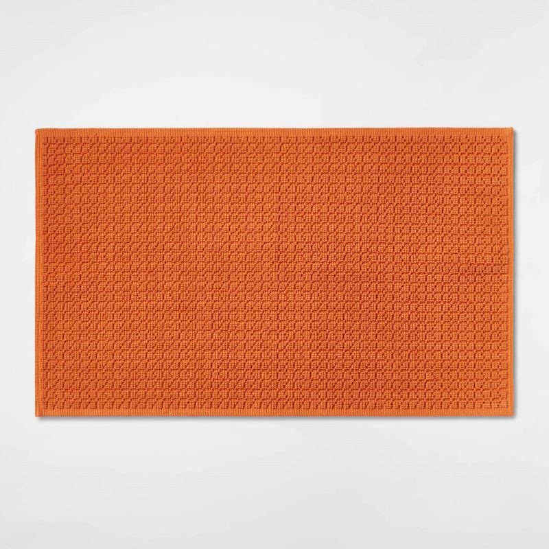 slide 1 of 3, 20"x34" Antimicrobial Bath Rug Orange - Threshold™, 1 ct