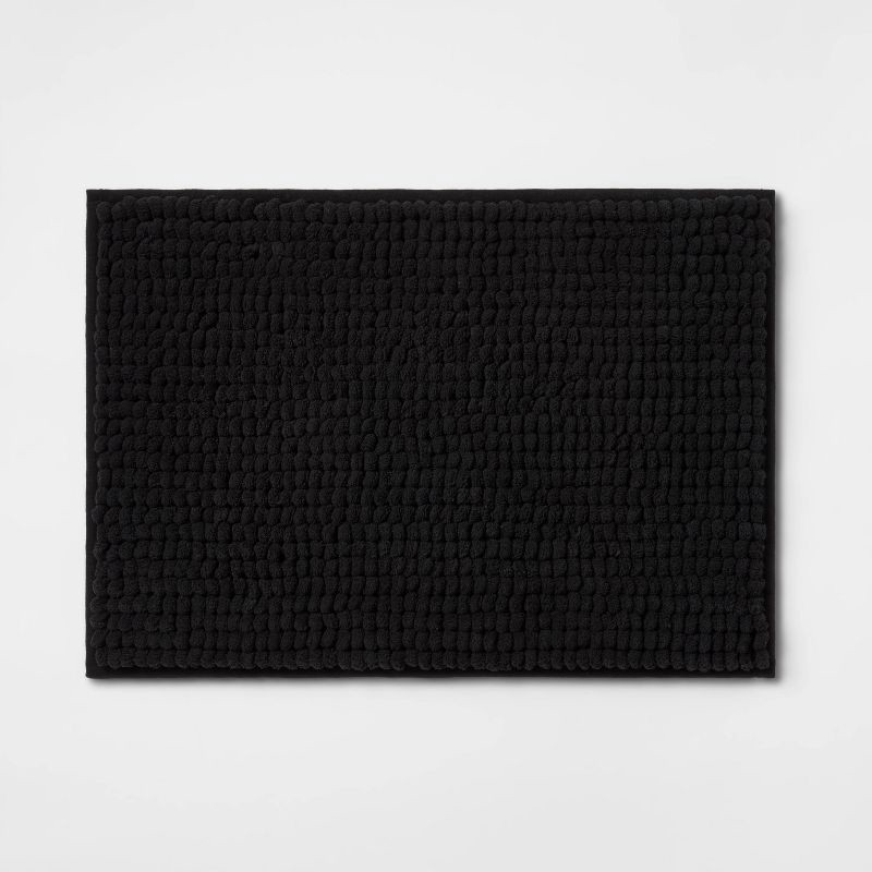 slide 1 of 6, 17"x24" Chunky Chenille Cushion Foam Bath Rug Black - Room Essentials™, 1 ct