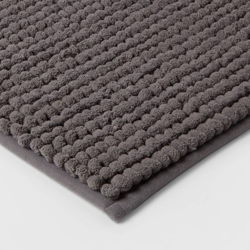 slide 3 of 7, 17"x24" Chunky Chenille Cushion Foam Bath Rug Dark Gray - Room Essentials™: Tufted Polyester, Machine Washable, 1 ct