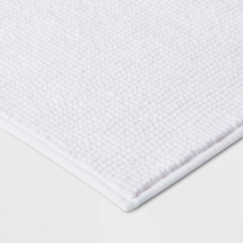 slide 3 of 7, 17"x24" Everyday Chenille Bath Rug White - Room Essentials™, 1 ct