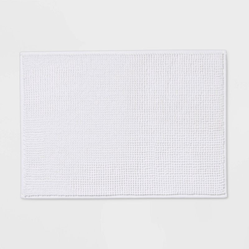 slide 1 of 7, 17"x24" Everyday Chenille Bath Rug White - Room Essentials™, 1 ct
