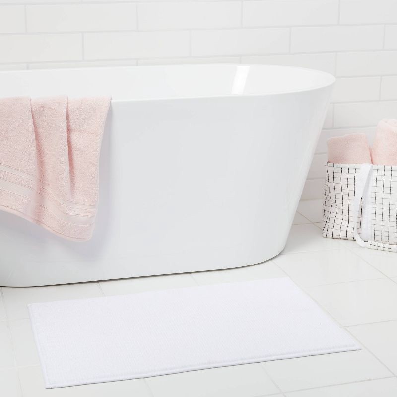slide 2 of 7, 20"x32" Everyday Chenille Bath Rug White - Room Essentials™: Machine Washable, Tufted Polyester, Non-Slip Backing, 1 ct