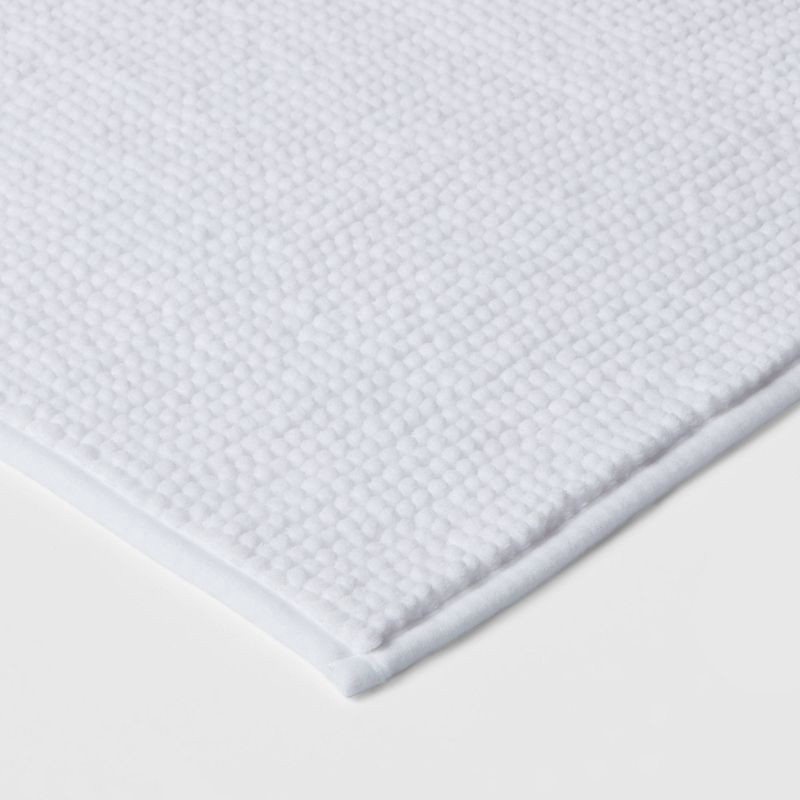 slide 3 of 7, 20"x32" Everyday Chenille Bath Rug White - Room Essentials™: Machine Washable, Tufted Polyester, Non-Slip Backing, 1 ct