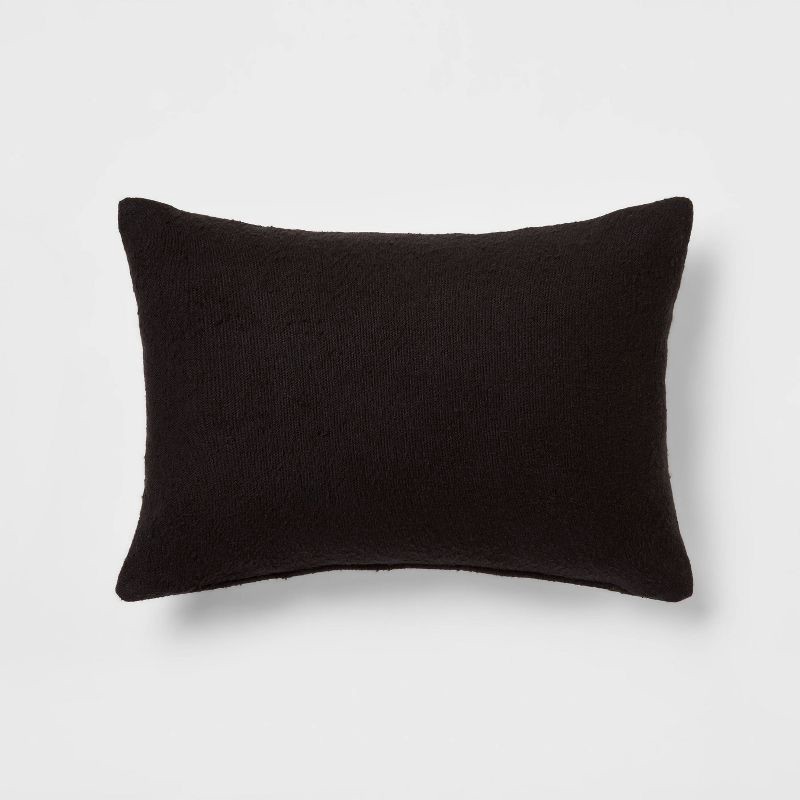 slide 1 of 4, Oblong Boucle Color Blocked Decorative Throw Pillow Black - Threshold™, 1 ct