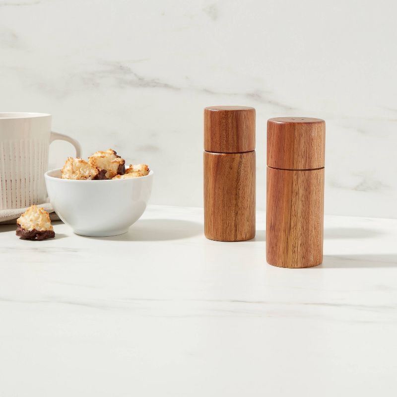 slide 2 of 5, 2pc Acacia Round Salt Shaker & Pepper Grinder Set - Threshold™: Brown Spice Mills, 5" Height, 63 Volume Capacity, 2 ct