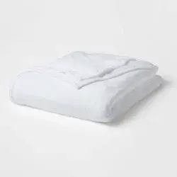 Full/Queen Solid Plush Bed Blanket True White - Room Essentials™