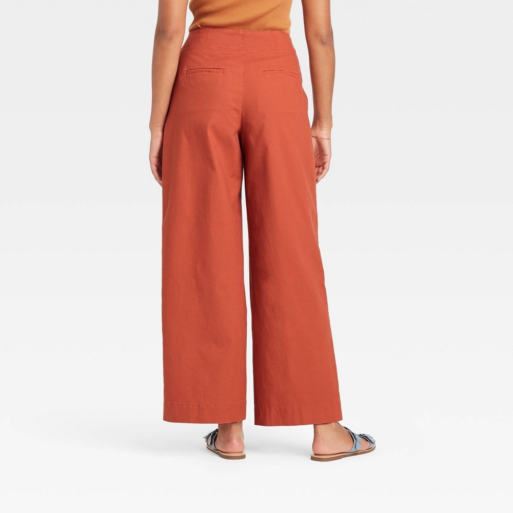 slide 2 of 3, Women's High-Rise Pleat Front Wide Leg Trousers - A New Day Orange 16, 1 ct