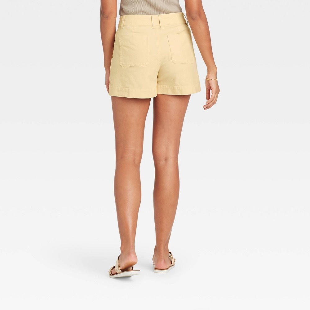 slide 2 of 3, Women's High-Rise Utility Pocket Shorts - A New Day Light Yellow 10, 1 ct