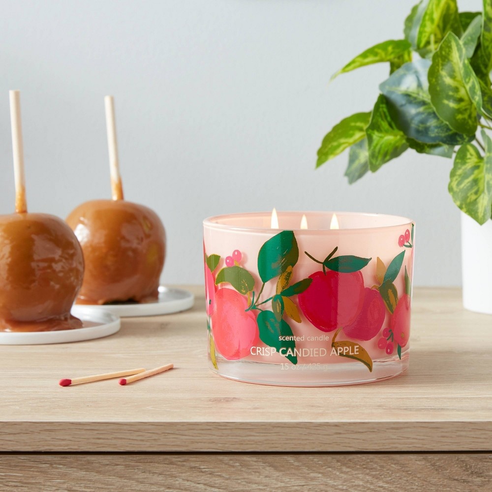 slide 3 of 4, Lidded Glass Jar Apple Print 3-Wick Crisp Candied Apple Candle - Opalhouse, 15 oz