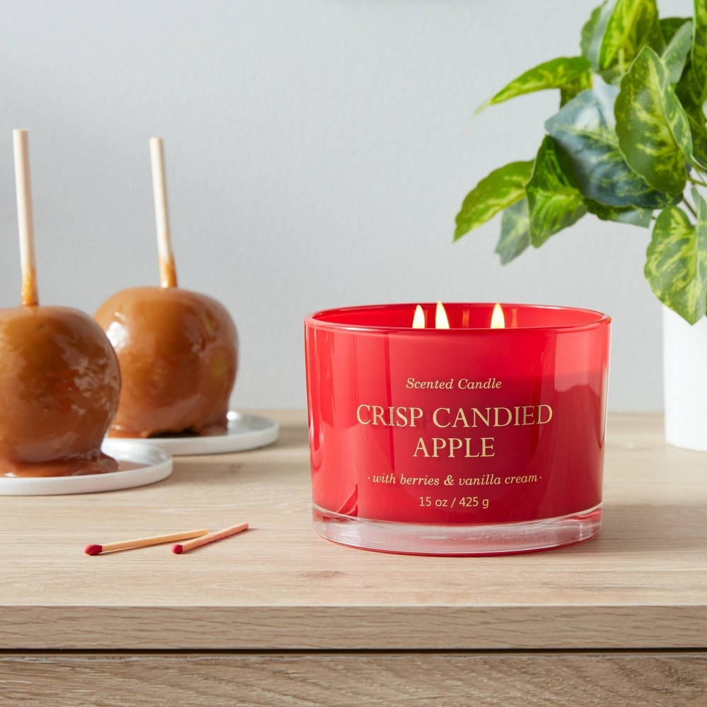 slide 3 of 4, Lidded Glass Jar Solid Red 3-Wick Crisp Candied Apple Candle - Opalhouse, 15 oz