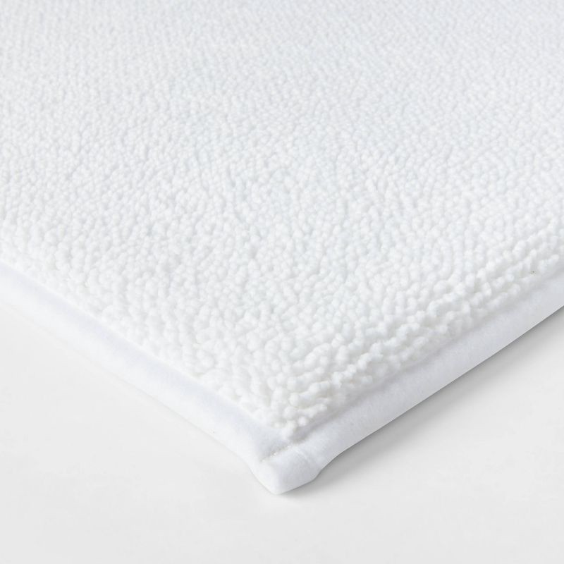 slide 3 of 4, 20"x34" Fine Chenille Memory Foam Bath Rug White - Threshold™: Luxurious, Soft, Knitted, Machine Washable, Non-Slip Backing, 1 ct