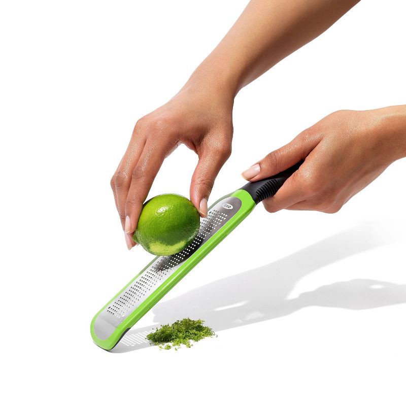 slide 5 of 9, OXO Etched Zester: Stainless Steel Lemon & Garlic Grater, Soft-Grip Handle, Dishwasher-Safe, Green, 1 ct