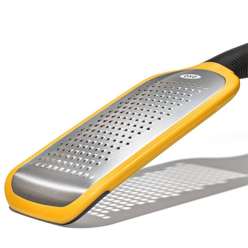 slide 4 of 8, OXO Etched Medium Grater: Stainless Steel Handheld Cheese Grater with Soft-Grip Handle, Dishwasher-Safe, Yellow, 1 ct