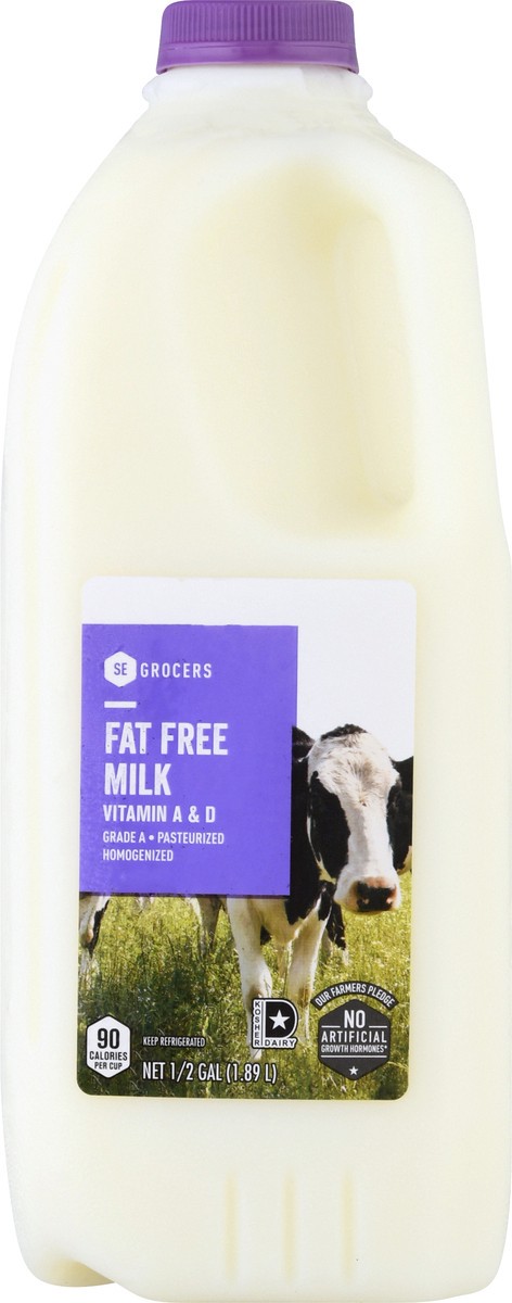 slide 1 of 12, SE Grocers Fat Free Milk, 1/2 gal