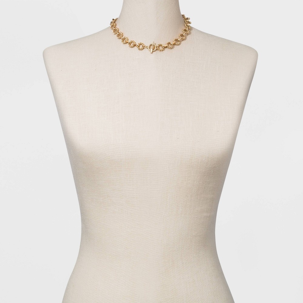 slide 2 of 3, Twisted Toggle Closure Chain Statement Necklace - A New Day Gold, 1 ct