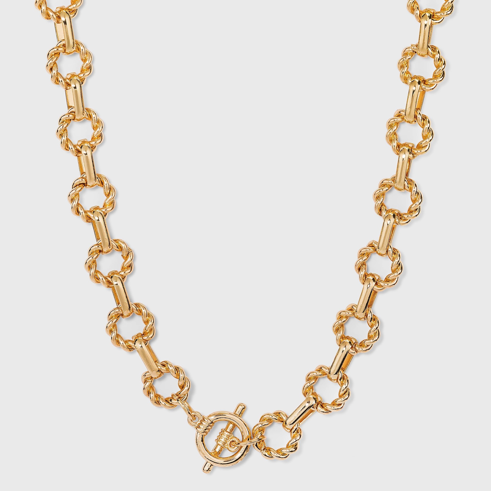 slide 1 of 3, Twisted Toggle Closure Chain Statement Necklace - A New Day Gold, 1 ct