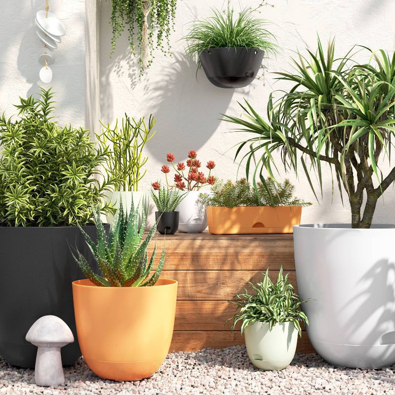 slide 2 of 4, Self-Watering Plastic Indoor Outdoor Planter Pot White 20"x20" - Room Essentials™: Modern Round Freestanding Planter, 1 ct