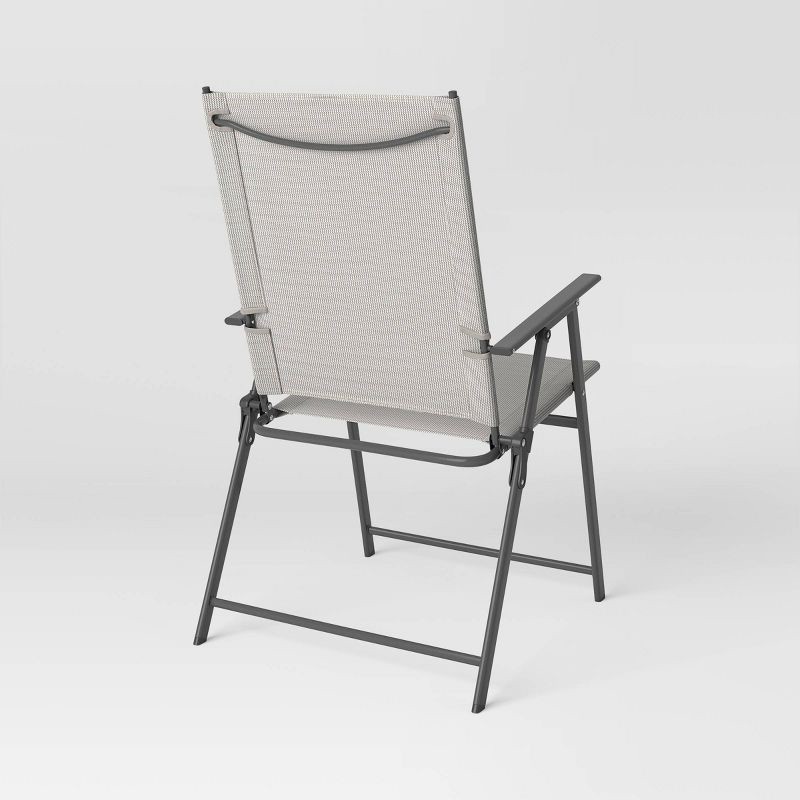 slide 4 of 8, Sling Patio Dining Folding Chair Tan - Room Essentials™, 1 ct