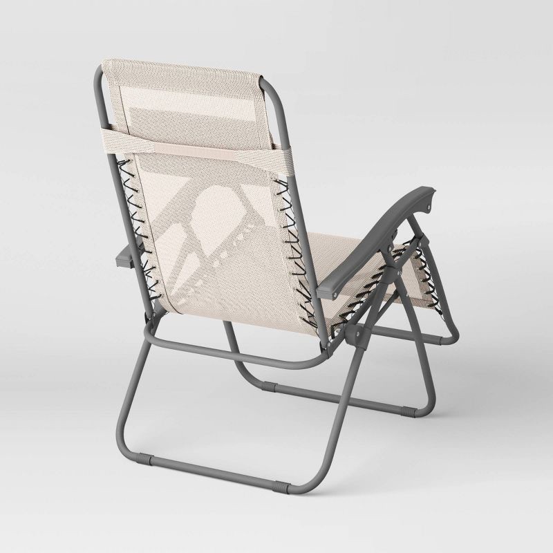 slide 5 of 7, Zero Gravity Outdoor Portable Folding Lounge Chair Tan - Room Essentials™, 1 ct