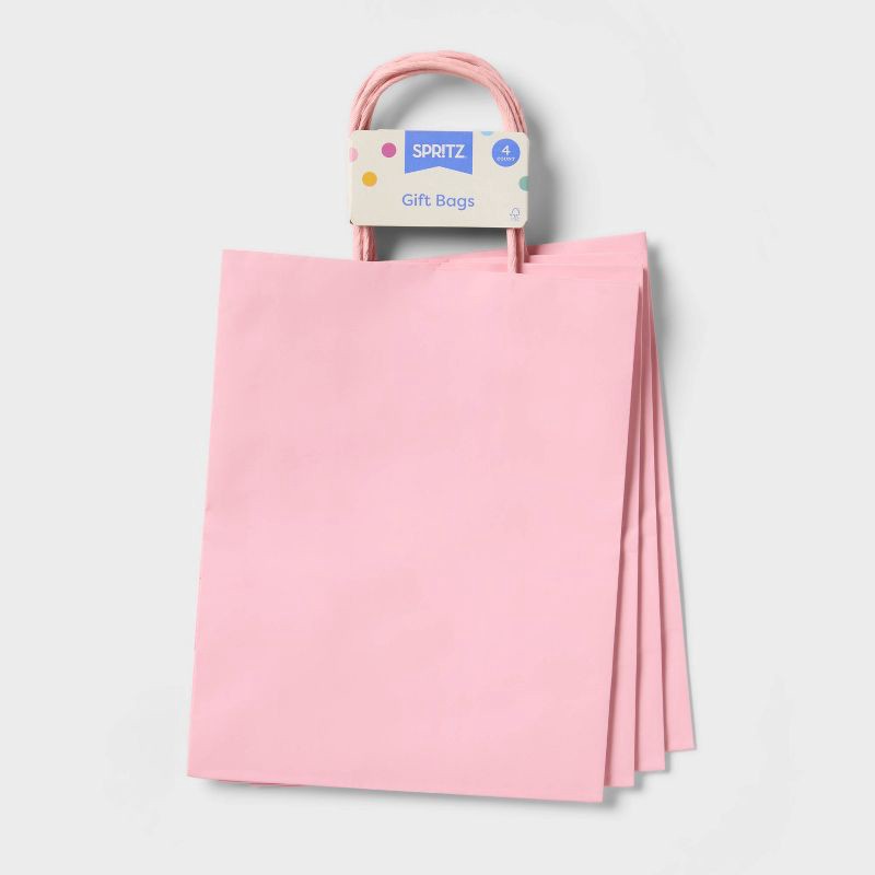slide 1 of 4, 4pk Small Gift Bag Light Pink - Spritz™, 4 ct
