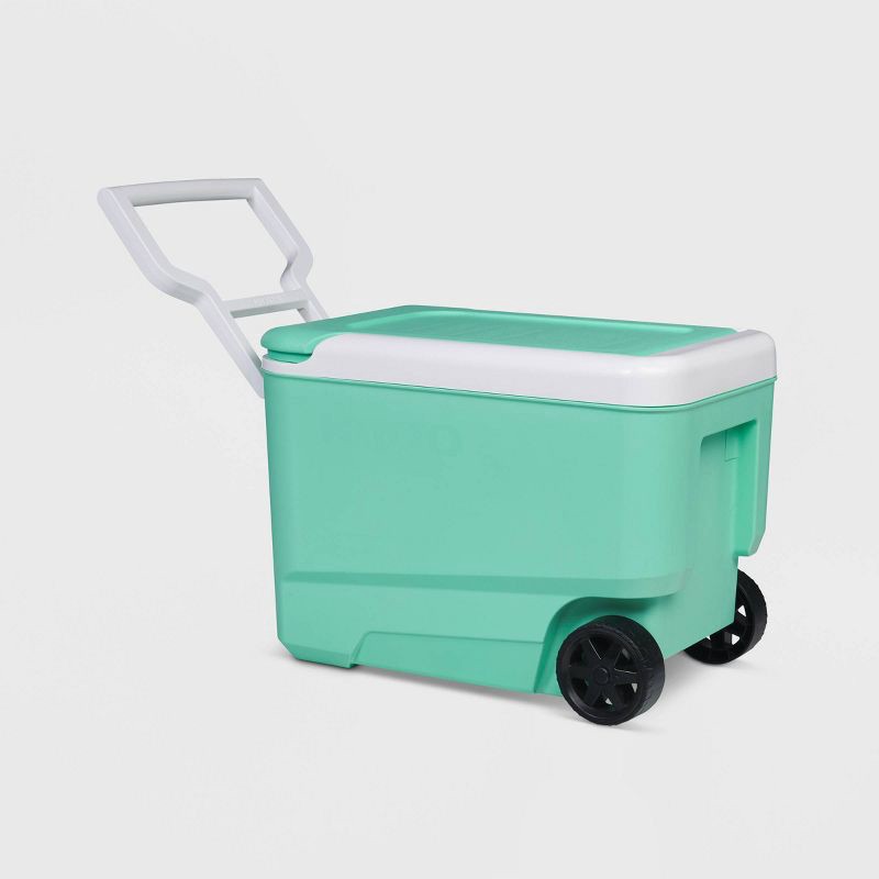 slide 3 of 12, Igloo Wheelie Cool 38qt Rolling Cooler - Mint: 53 Can Capacity, Hard-Sided Design, 38 qt, 53 can