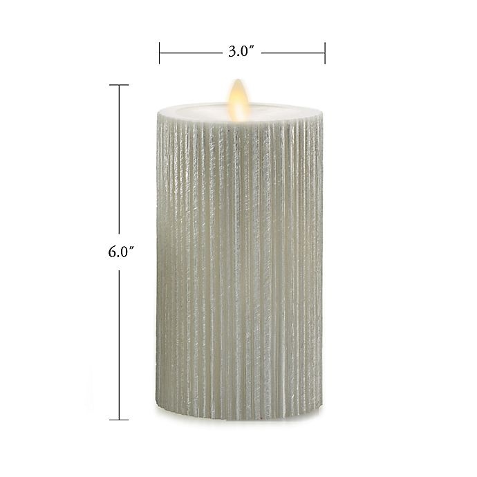 slide 2 of 3, Luminara Moving Flame Champagne Ribbed Real-Flame Effect Pillar Candle, 6.5 in